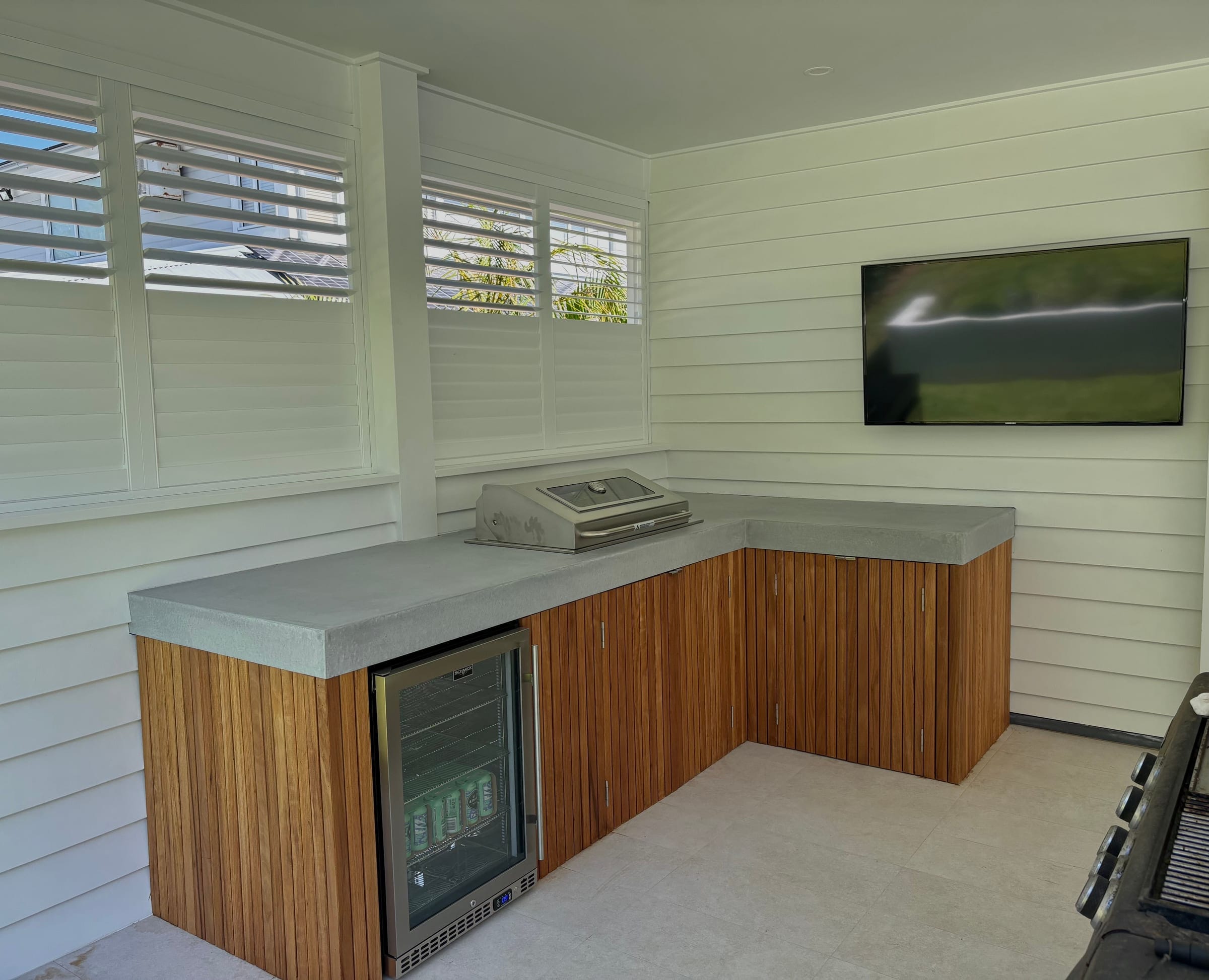 Avalon residence — custom architectural concrete benchtop with integrated BBQ