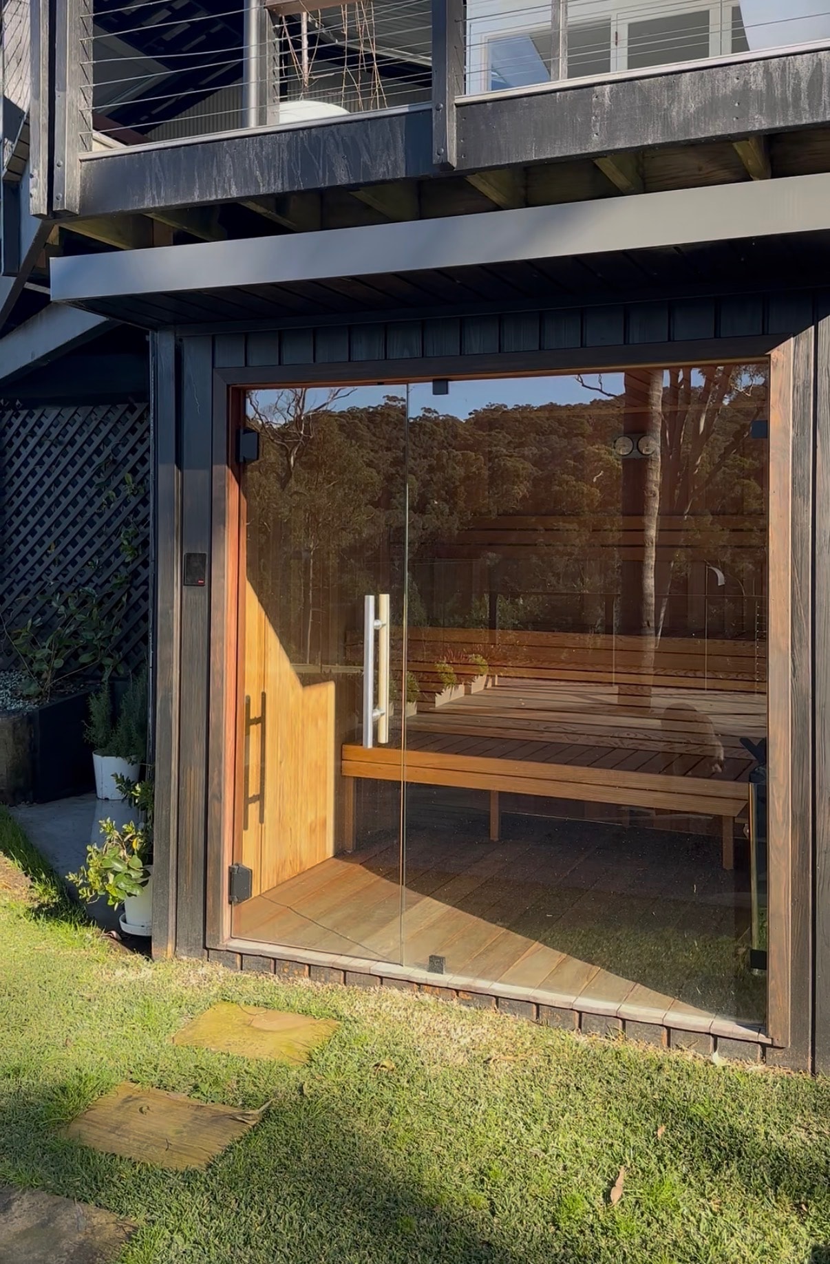 Sauna area — burnished architectural concrete slab foundation for outdoor sauna